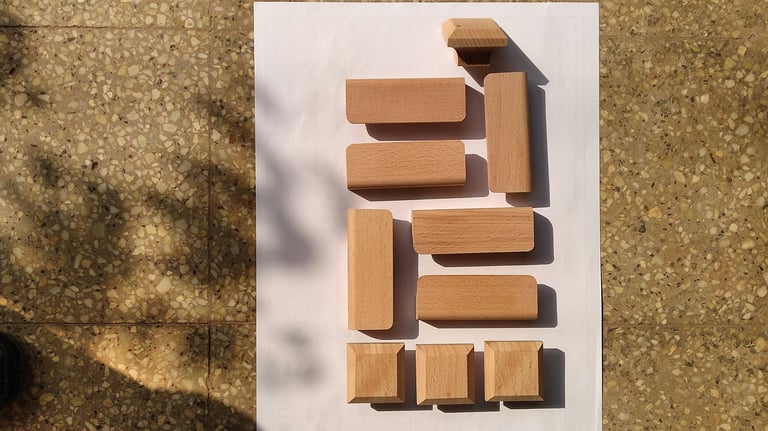 Top-down photo of an arrangement of wooden blocks. Credit Santosh PK via Unsplash.