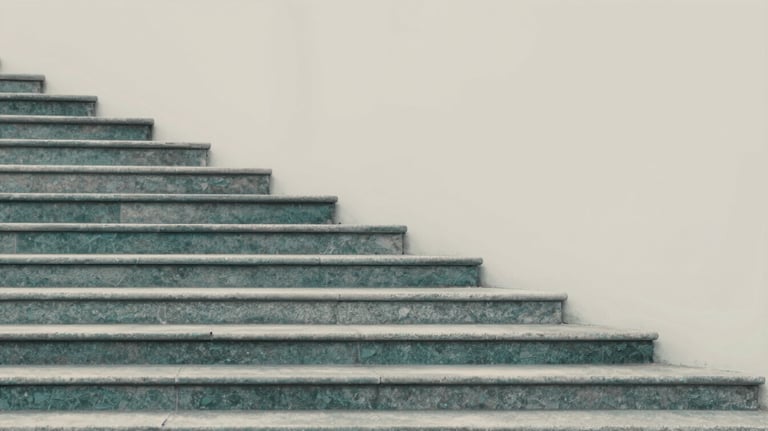 A sequence of stone steps leading upward in a clean, minimalist landscape, representing the gradual power of the PPP methodology. Soft teal and grey tones #A7C2BF.