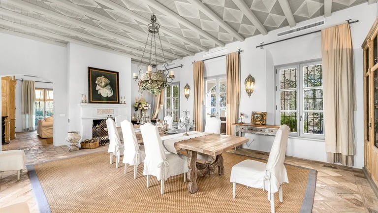 Elegant dining room with rustic beams at Finca Santa Katerina