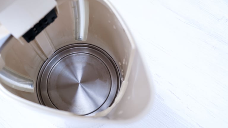 a blender with a metal bowl and a metal bowl