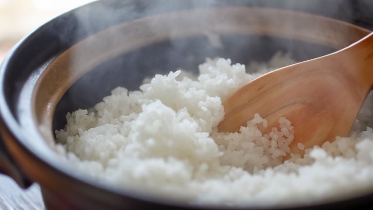 a wooden spoon with a wooden spoon in it