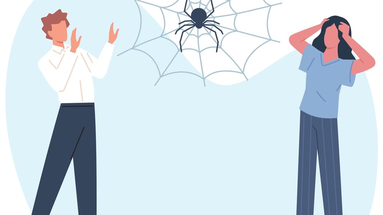 a man and woman are standing in front of a spider webpage