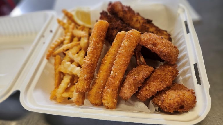 Pick 3 Meal with fried Pacific cod, fried shrimp, calamari and crinkle‑cut fries from Captain’s Galley