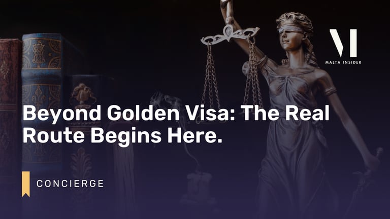 a statue of a lady holding a sword and a sword