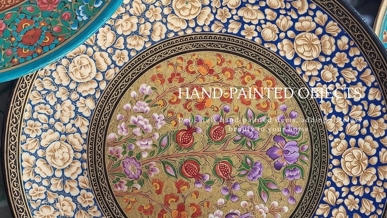 Hand-painted Kashmiri papier-mâché decorative objects made by artisans using traditional techniques.