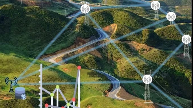 Digital data network and wireless communication towers across a rural green mountain landscape.