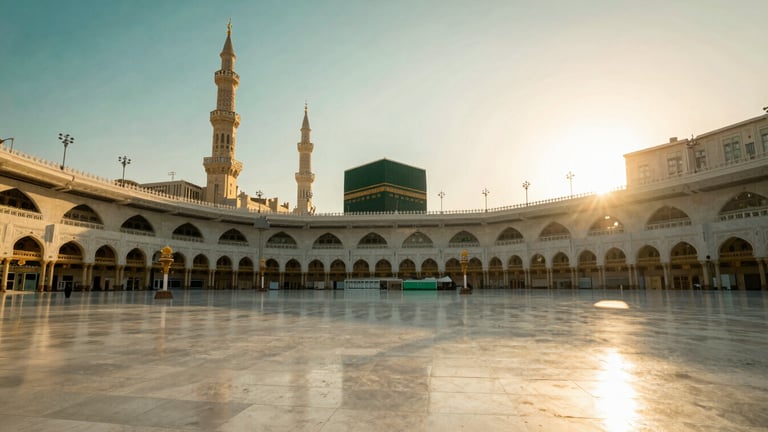 Wide panoramic environmental shot of the serene courtyard of the Grand Mosque in Makkah during dawn, soft golden-hour natural light casting long shadows, deep emerald and gold tones, 35mm lens