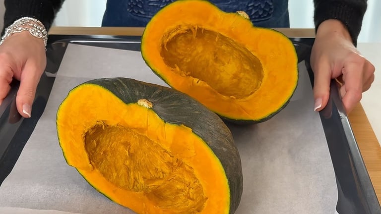 Cut the pumpkin in half, remove the seeds and roast it
