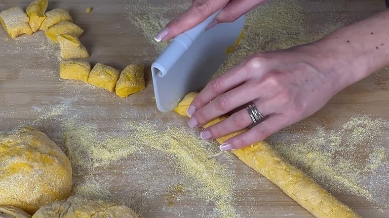 Cutting the rope into pieces to make gnocchi
