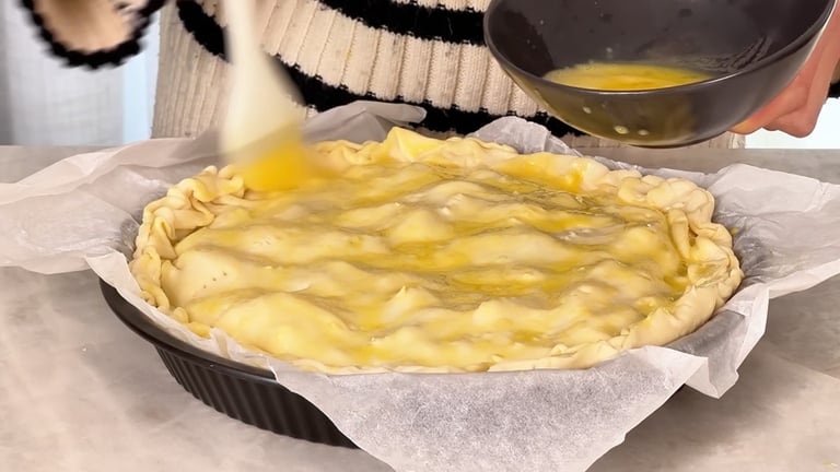 Fill, seal and brush the pie