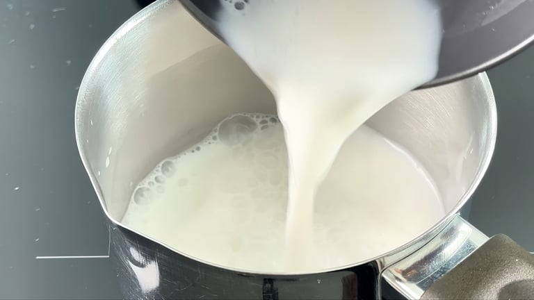 Warm the milk to a gentle simmer