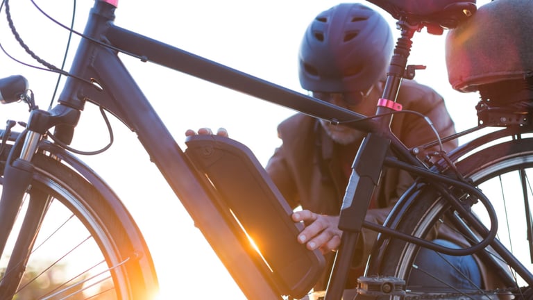 a person in a helmet and a helmet on a bicycle