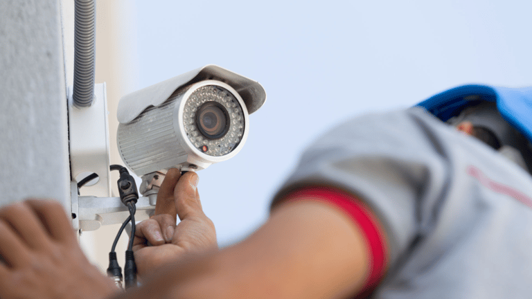 a security camera mounted on a wall