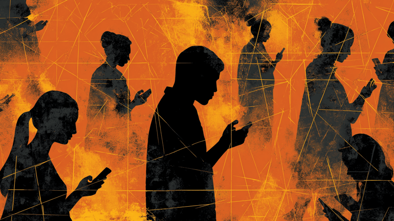 a group of people standing around a cell phone