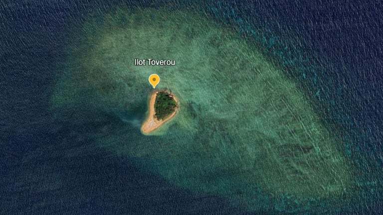 a small island with a yellow pinpoint marker marker on it