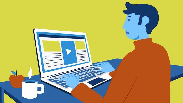 a man sitting at a desk with a laptop looking surprised