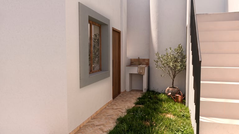 Minimalist Mediterranean patio with white walls, olive tree, and an outdoor stone sink.