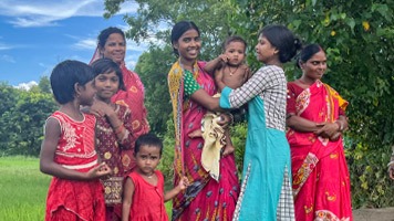 Women and girls in traditional West Bengal dress.