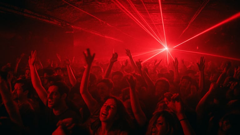Packed underground club room in Tel Aviv, low ceiling, red strobes, crowd with hands raised, 35mm film