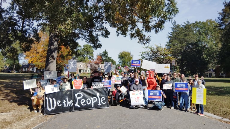 Neighbors prepare for our first community micro-march.