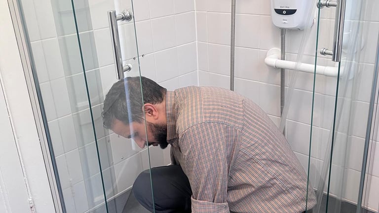 man fixing the shawer