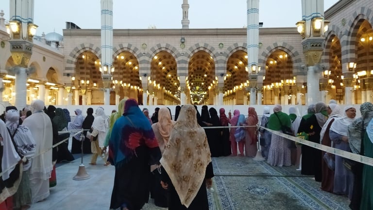 a woman in a black dress and a man in a white dress