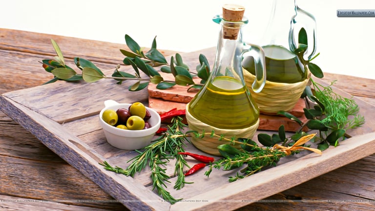 olive oil and olive oil bottles with olive oil and herbs