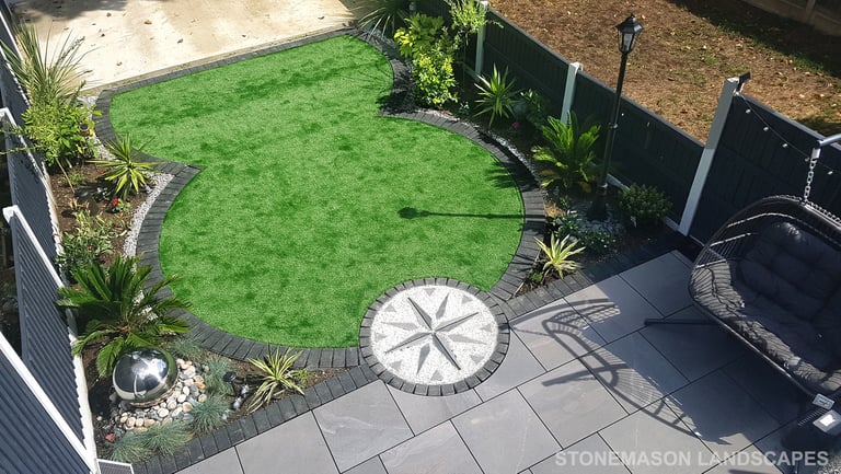 Exotic Modern Dynamic Designer Circle Lawn Tropical Small Garden