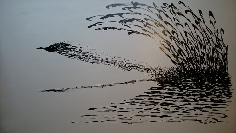 a bird flying over a body of water