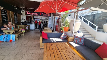 Tasca Pizza right next door to Gone Surfing holiday studio apartment