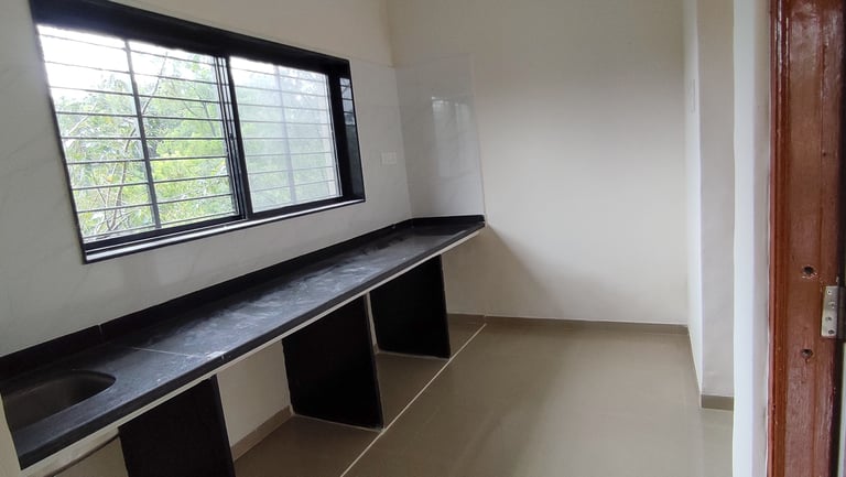 Kitchen in an affordable real estate in Igatpuri