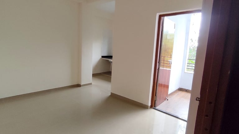 Spacious living room at Lakefield Apartments with modern interiors at Igatpuri