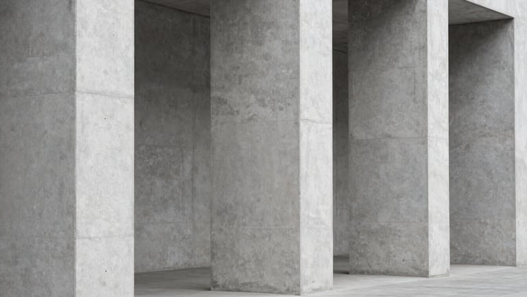 Straight-on architectural photograph of minimalist concrete columns and diffused daylight, sharp focus, neutral gray tones, 35mm