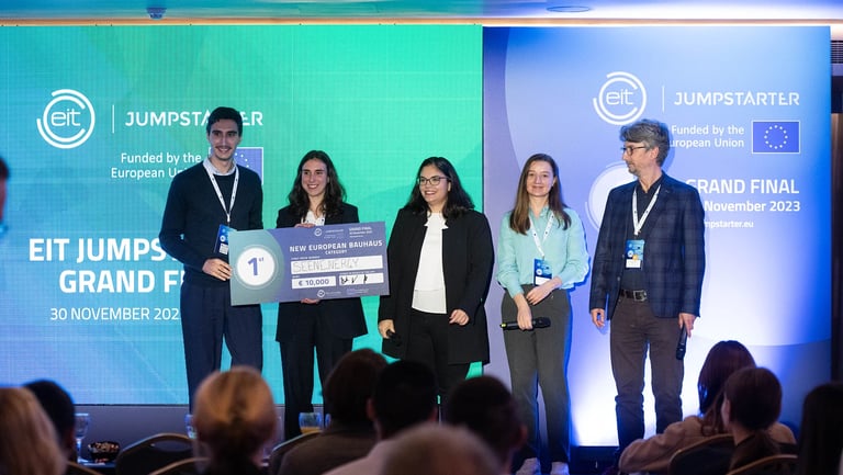 a group of people standing on a stage
