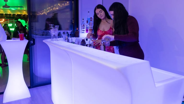 Vow renewal event in Redland Bay hired glow bar, cocktail tables and neon.