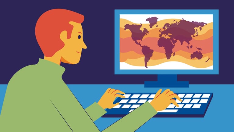 a man sitting at a desk with a computer monitor and a keyboard, the world's map on the screen