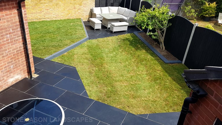 Corner Triangle Garden With Black & Grey Limestone Patio Sleeper Retaning Walls Multi-tier Level