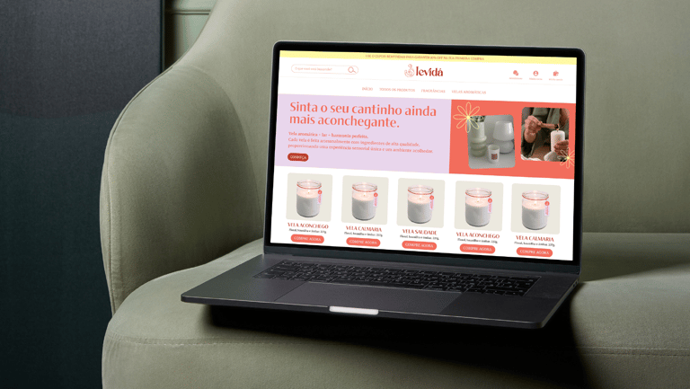 a laptop computer sitting on a couch with a laptop on it