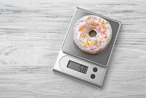 food scale with a doughnut
