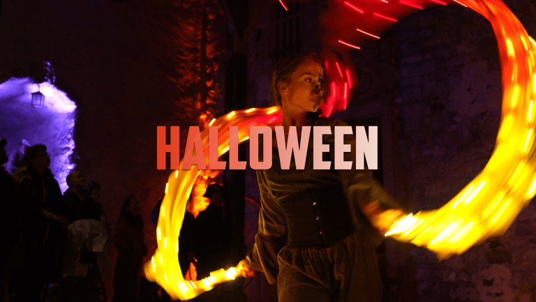 spectacle halloween chateau de chillon suisse femme danse avec ruban lumineux