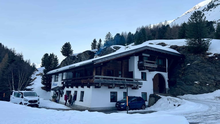 a house with a mountain view in austria