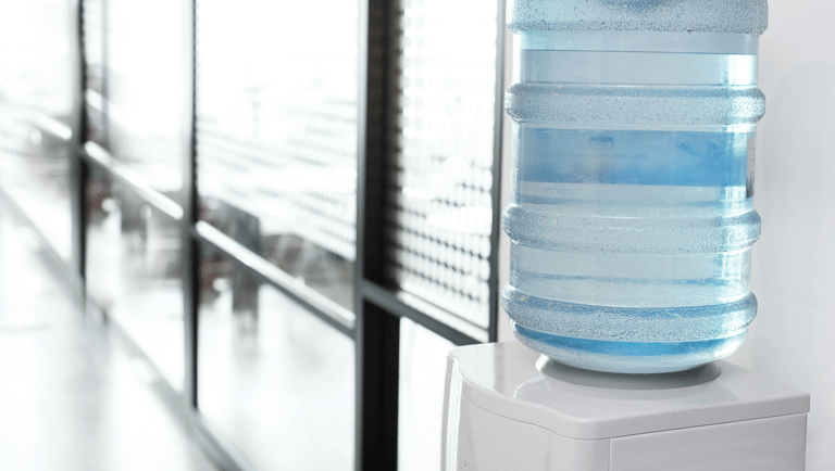 a water bottle with a water bottle on top of it