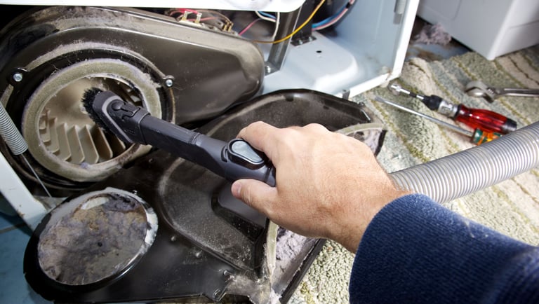 a person holding a brush and a brush in their hand