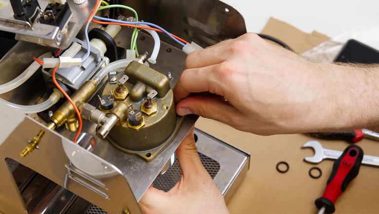 a person is working on a machine that is being worked on
