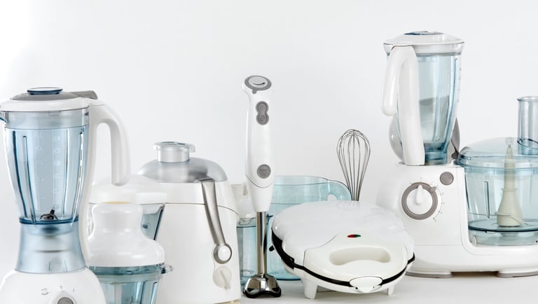 a bunch of food processors and blender