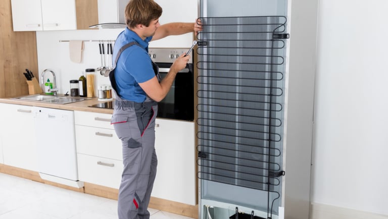 a man in a blue shirt and a white shirt is standing in front of a