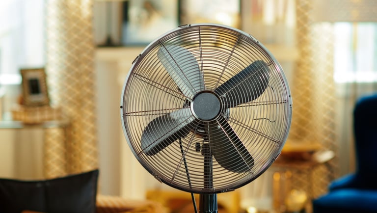 a fan on a table top with a fan