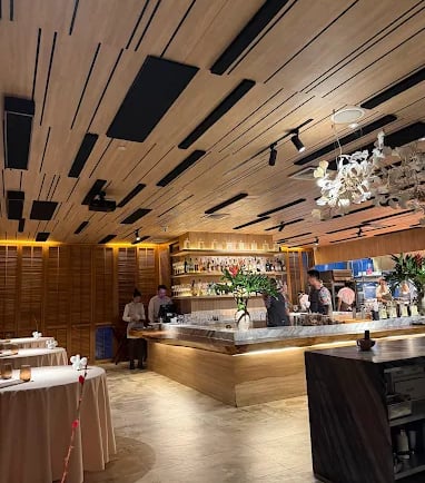 a restaurant with a bar and a bar with a bar