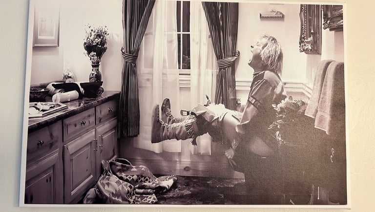 Black and white Dumb and Dumber wall art framed above toilet — funny bathroom decor with classic com