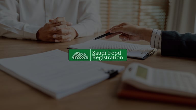 reviewing SFDA health claim documents at a desk, symbolizing regulatory consultation by Saudi Food Registration.